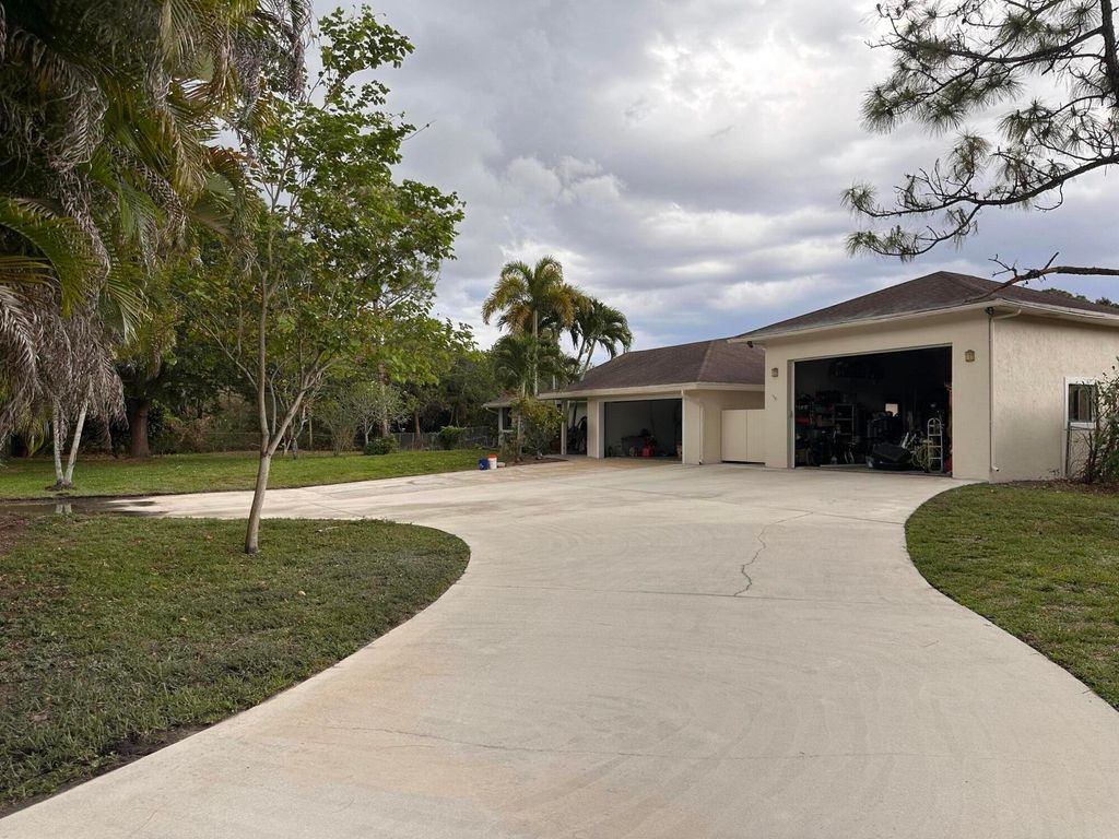 Photo of 8264 Palomino Drive, Lake Worth, FL 33467 (MLS # B26021155)