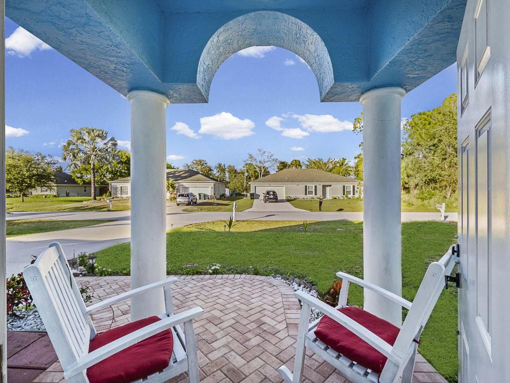 Photo of 982 SW Worcester Lane, Port Saint Lucie, FL 34953 (MLS # R11155179)