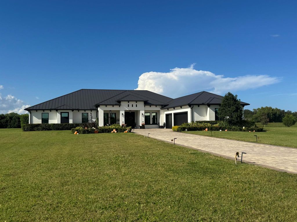 Photo of 3865 SW Stoneybrook Way, Palm City, FL 34990 (MLS # R11145561)