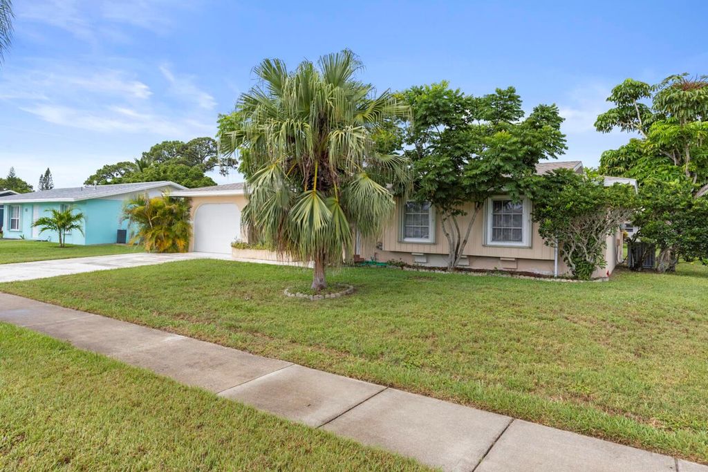 Photo of 740 SW Goodrich Street, Port Saint Lucie, FL 34983 (MLS # R11098933)