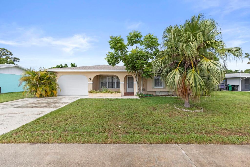 Photo of 740 SW Goodrich Street, Port Saint Lucie, FL 34983 (MLS # R11098933)
