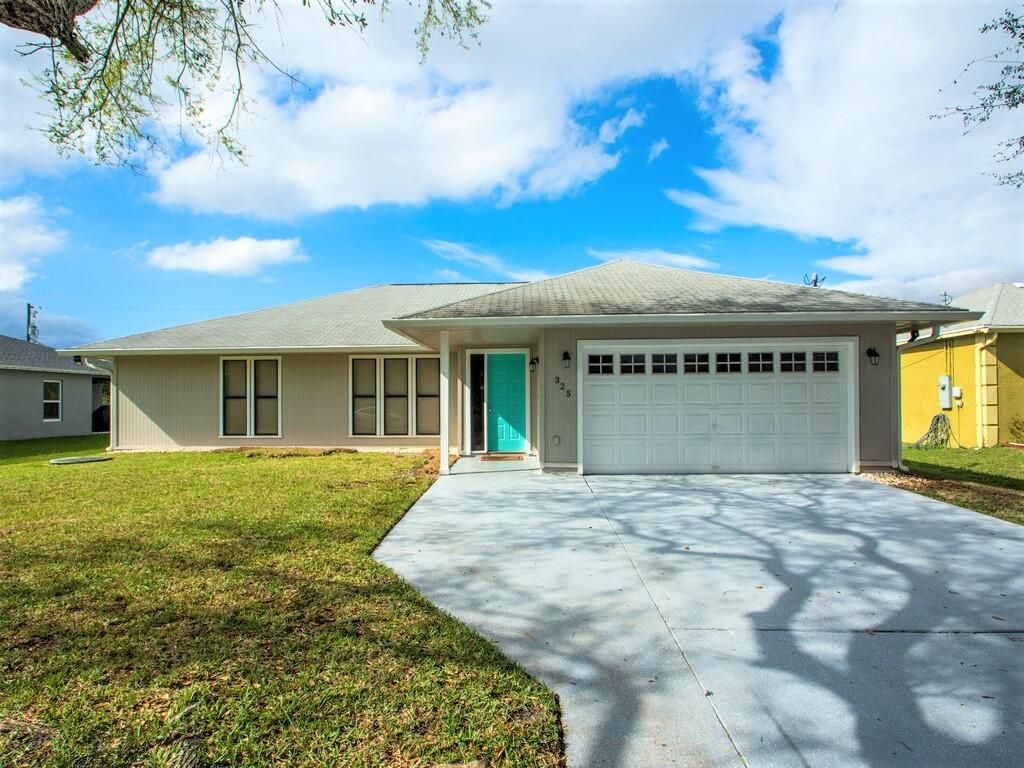 Photo of 325 SW Grimaldo Terrace, Port Saint Lucie, FL 34984 (MLS # R11081065)