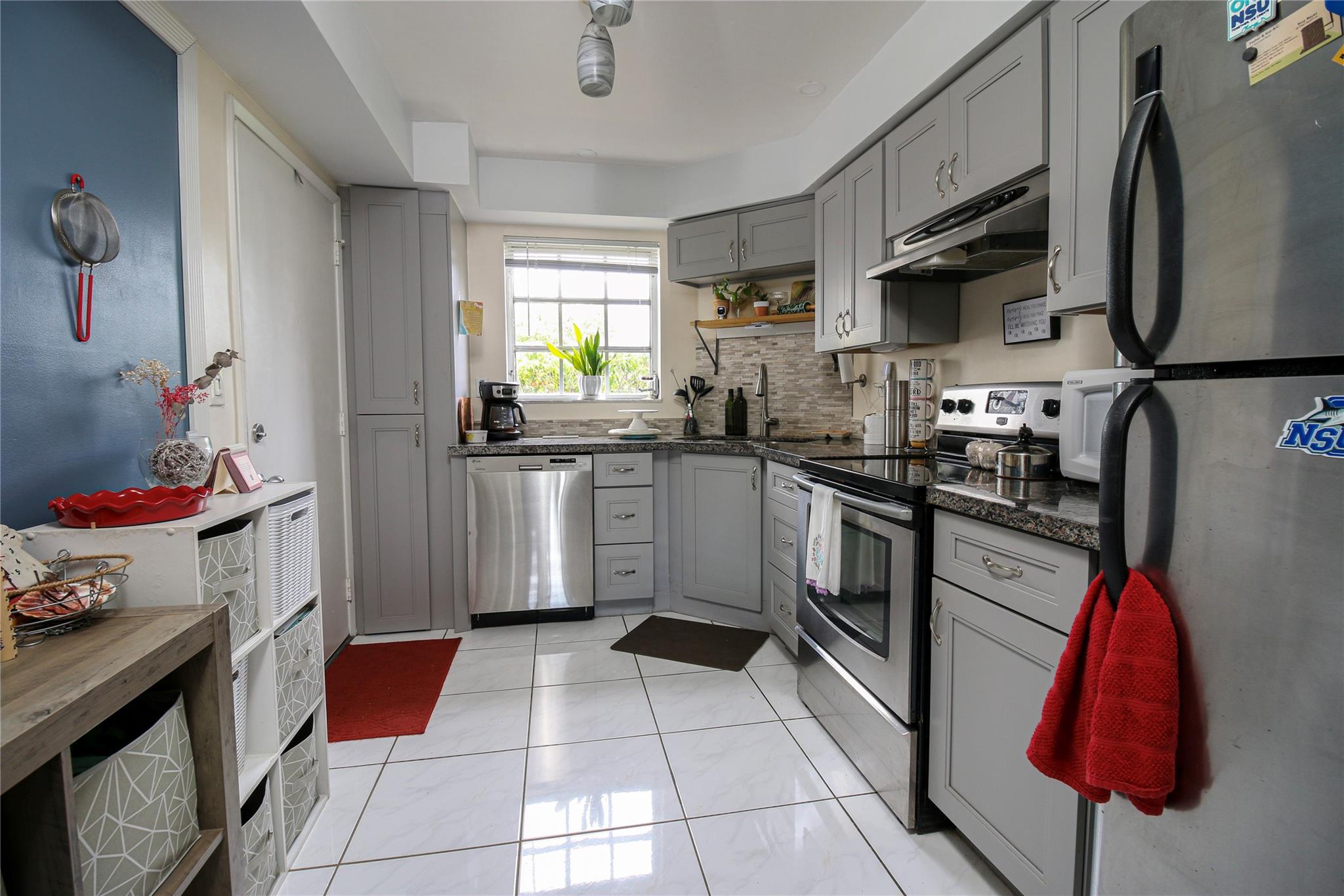 Briarwood Club in the heart of Coral Springs, tucked behind Village on the Green. Enjoy sunrises over a green backyard and canal, and sunsets from your updated kitchen. This upgraded 2-bed, 2-bath end-unit features granite countertops, modern cabinets, backsplash, ceramic tile and vinyl floors, upgraded ceilings, a spacious master suite with closets, and a new hot water heater. Enjoy a private screened lanai with backyard access and scenic windows throughout. Community includes a pool, clubhouse, dog walk, and laundry. Walk to City Hall events, The Walk, Trader Joe’s, and shops. SIRS compliant.