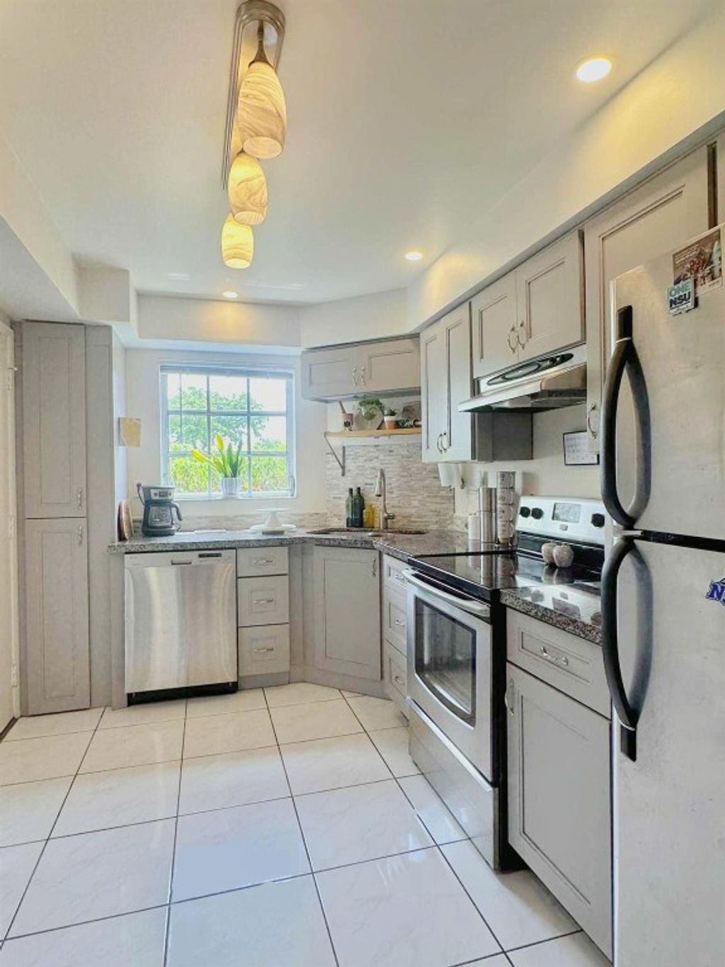 Photo of 3475 Broken Woods Drive #101, Coral Springs, FL 33065 (MLS # F10507574)