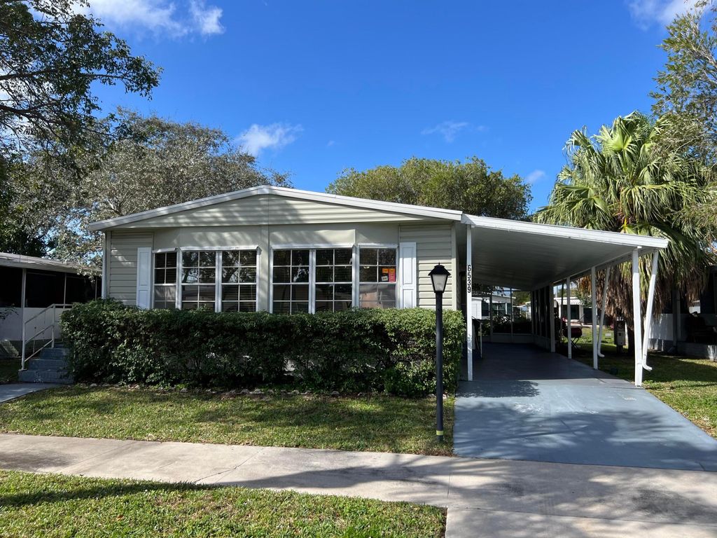 Photo of 6539 NW 36th Avenue, Coconut Creek, FL 33073 (MLS # R10954588)