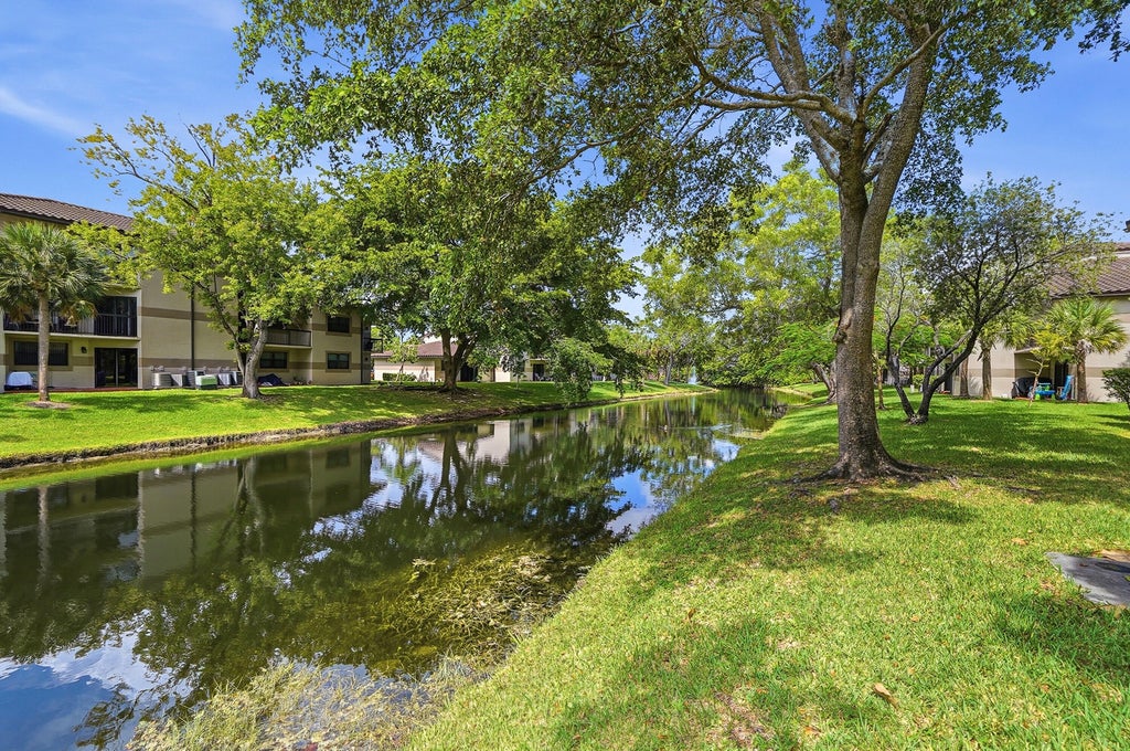 Photo of 9938 NOB HILL Lane #9938, Sunrise, FL 33351 (MLS # B26057866)