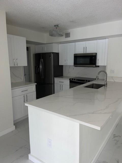 Beautifully Renovated 2-Bedroom, 2-Bath Condo in Prime Location
This fully updated unit offers modern living at its finest. Featuring a sleek kitchen with stainless steel appliances, quartz countertops, and stylish light fixtures, this home is move-in ready. Enjoy large-format tile flooring throughout and two beautifully renovated bathrooms, including a walk-in shower in the primary suite.
Located within walking distance to Monarch High School and directly across from the Coconut Creek Promenade, you'll have shopping, dining, and entertainment at your doorstep. Situated in a secure, gated community.
Available August 1st. Tenant-occupied – showings by appoint only. First month, last month, and security deposit required for move-in. Please refer to broker remarks for viewing instructions.