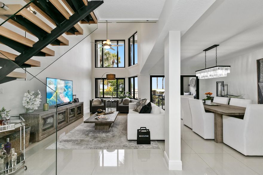 Beautifully renovated two story condo that lives like a townhouse just steps away from the beach! Gorgeously furnished with Restoration Hardware furniture. Comes with two parking spots and two storage closets. Located across the street from the beach. Full impact windows & sliders. Enjoy ocean views from your bedroom! Volume ceilings in the living room with electric shades you can control from a remote. Upstairs has two en suite primary bedrooms. Move in with just your suitcase and immediately start enjoying that beachside lifestyle!