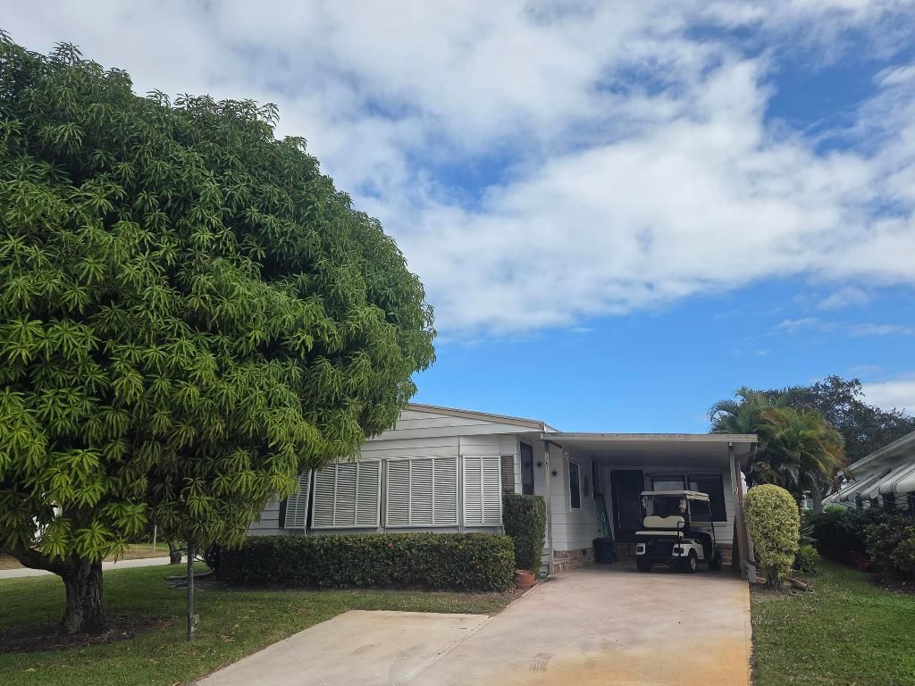 Photo of 7761 SE Shenandoah Drive, Hobe Sound, FL 33455 (MLS # R11158476)