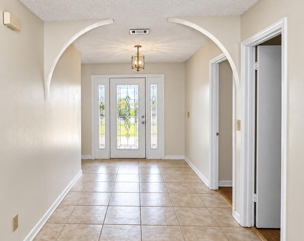 Photo of 1309 SE Coral Reef Street, Port Saint Lucie, FL 34983 (MLS # B26080251)