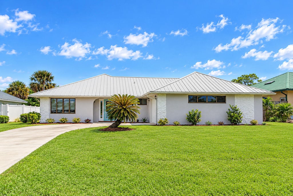 Photo of 1309 SE Coral Reef Street, Port Saint Lucie, FL 34983 (MLS # B26080251)