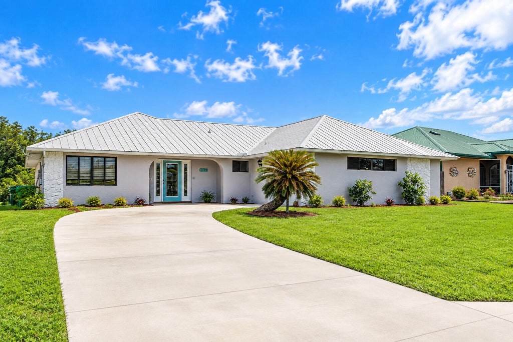 Photo of 1309 SE Coral Reef Street, Port Saint Lucie, FL 34983 (MLS # B26080251)