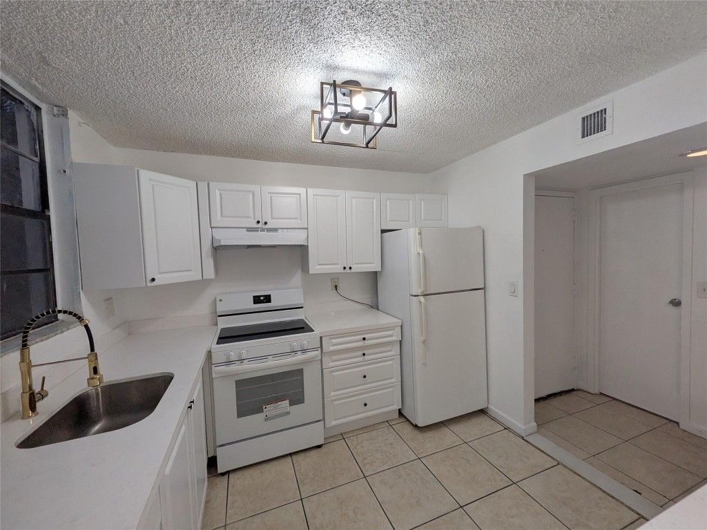 Photo of 1788 NW 55th Avenue #204, Lauderhill, FL 33313 (MLS # F10545988)