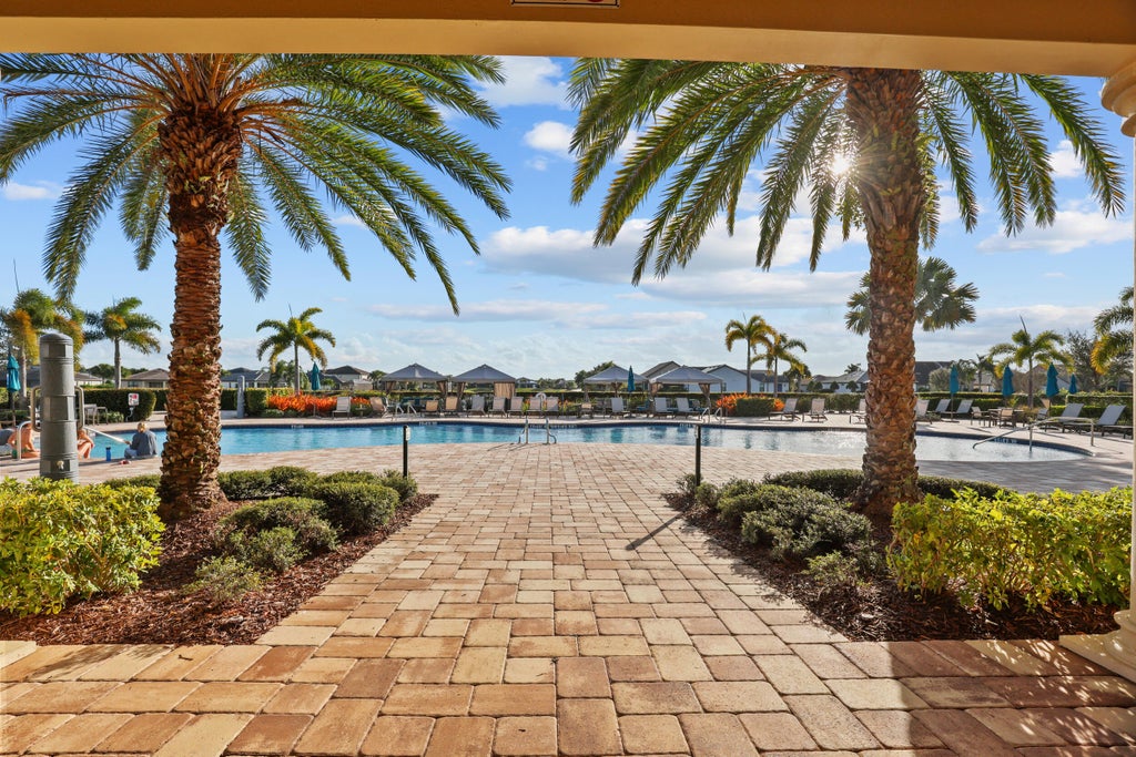 Photo of 786 SE COURANCES Drive, Port Saint Lucie, FL 34984 (MLS # B26072876)