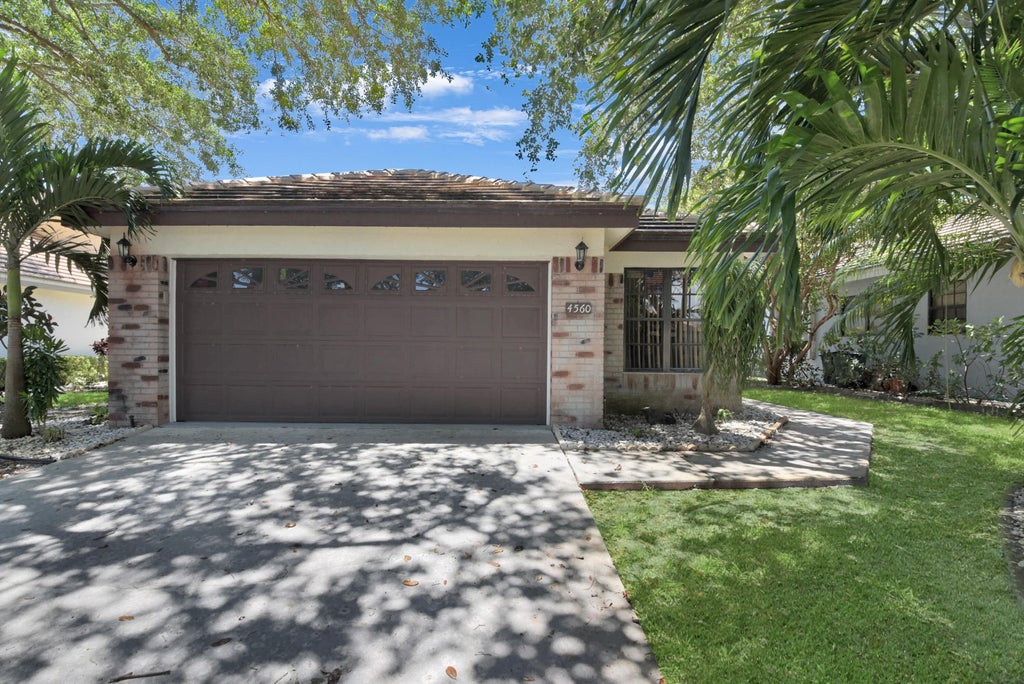 Photo of 4560 Sherwood Forest Drive, Delray Beach, FL 33445 (MLS # R11094381)