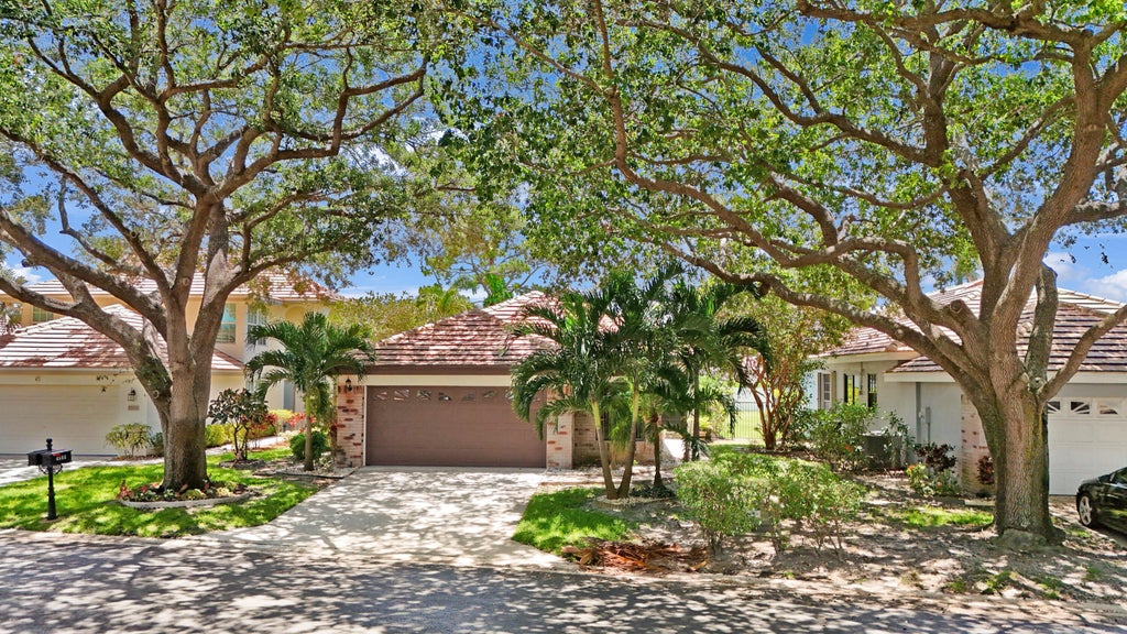 Photo of 4560 Sherwood Forest Drive, Delray Beach, FL 33445 (MLS # R11094381)