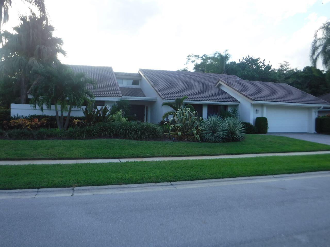 6 Month seasonal/ off season rental home in the Boca Woods Country Club including golf privileges. This beautiful, fully furnished home, newly renovated boasts an open living and entertaining concept. This home features a two car garage with golf cart parking. 3 Bedrooms and 4.5 baths, office, and dine-in kitchen. The stunning vaulted, wood ceiling enhances the living and dining room. The elongated granite entertaining bar is very inviting for parties and gatherings. The huge panoramic screen pool area has 2400 sf that offers a Zen-like feel. The pool and spa are inviting and the surrounding foliage offers privacy. Boca Woods Country Club is prestigious, yet relaxed private golf and country club community.