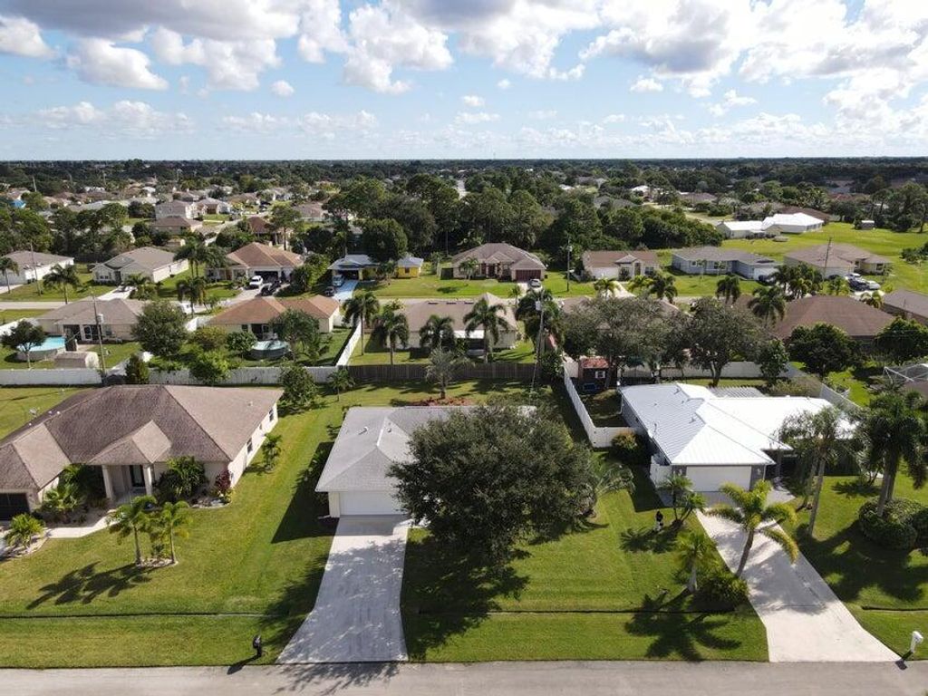 Photo of 3661 SW Camastro Street, Port St Lucie, FL 34953 (MLS # R10906701)