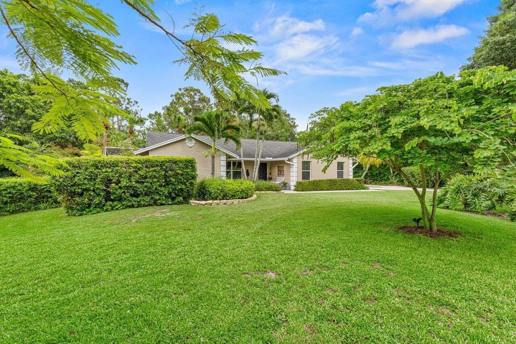 Photo of 16243 E Calder Drive, Loxahatchee, FL 33470 (MLS # R11097062)