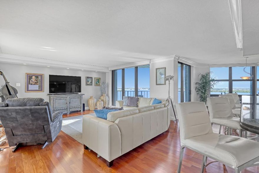 Enjoy stunning panoramic intracoastal blues stretching far and wide. This residence offers three distinct balconies, capturing both ocean and Intracoastal scenes from multiple angles. The primary suite includes a walk-in closet, an en-suite bath, and its own balcony—an ideal spot to take in the sunrise each morning.

An open kitchen and living area create a bright, welcoming space for entertaining while showcasing beautiful sunset views in the evenings. The home is equipped with new impact sliders for full storm protection.

Community amenities include a private pool, sauna, fitness center, and direct access to the beach.