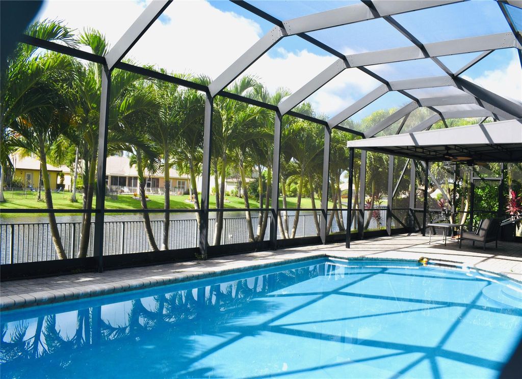 Photo of 10982 NW 70th Court, Parkland, FL 33076 (MLS # B26023373)