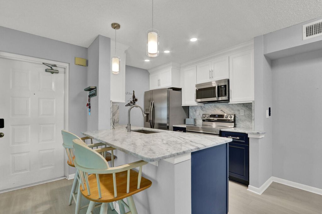 Photo of 2516 SE Anchorage Cove #108 - G2, Port Saint Lucie, FL 34952 (MLS # B26000371)