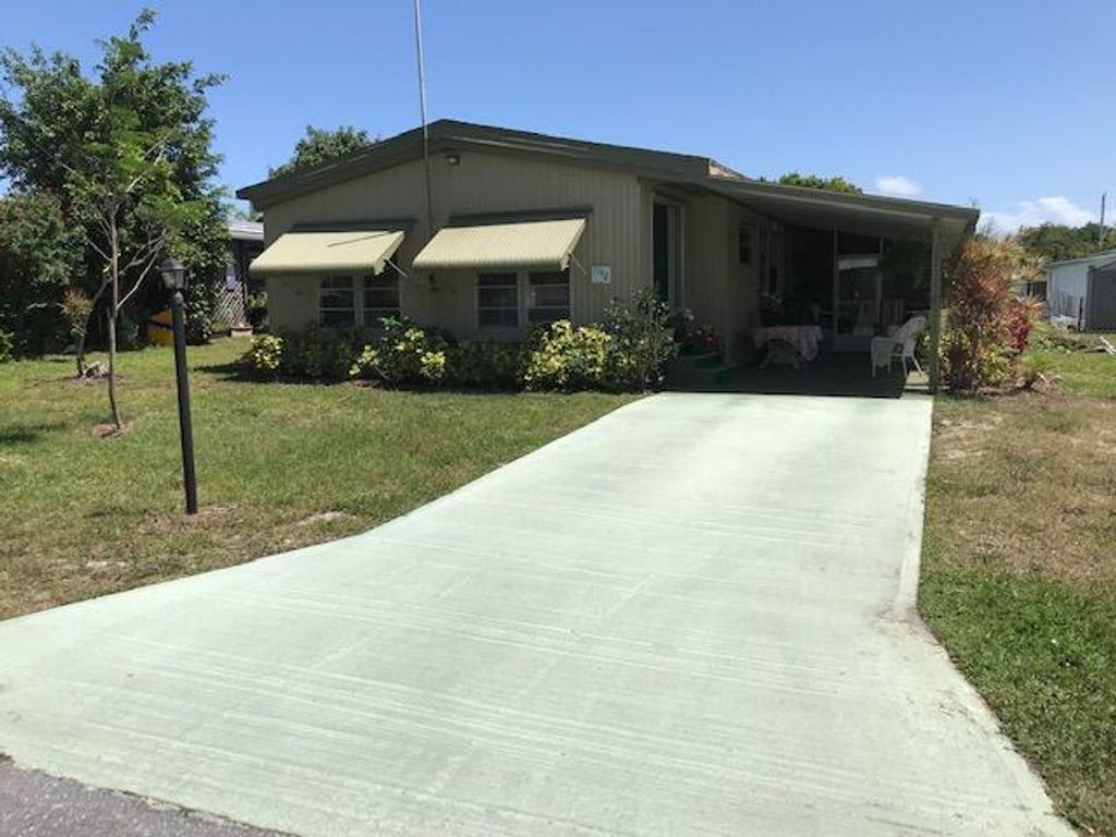 Photo of 7148 SE Seahawk Street, Hobe Sound, FL 33455 (MLS # R10794403)