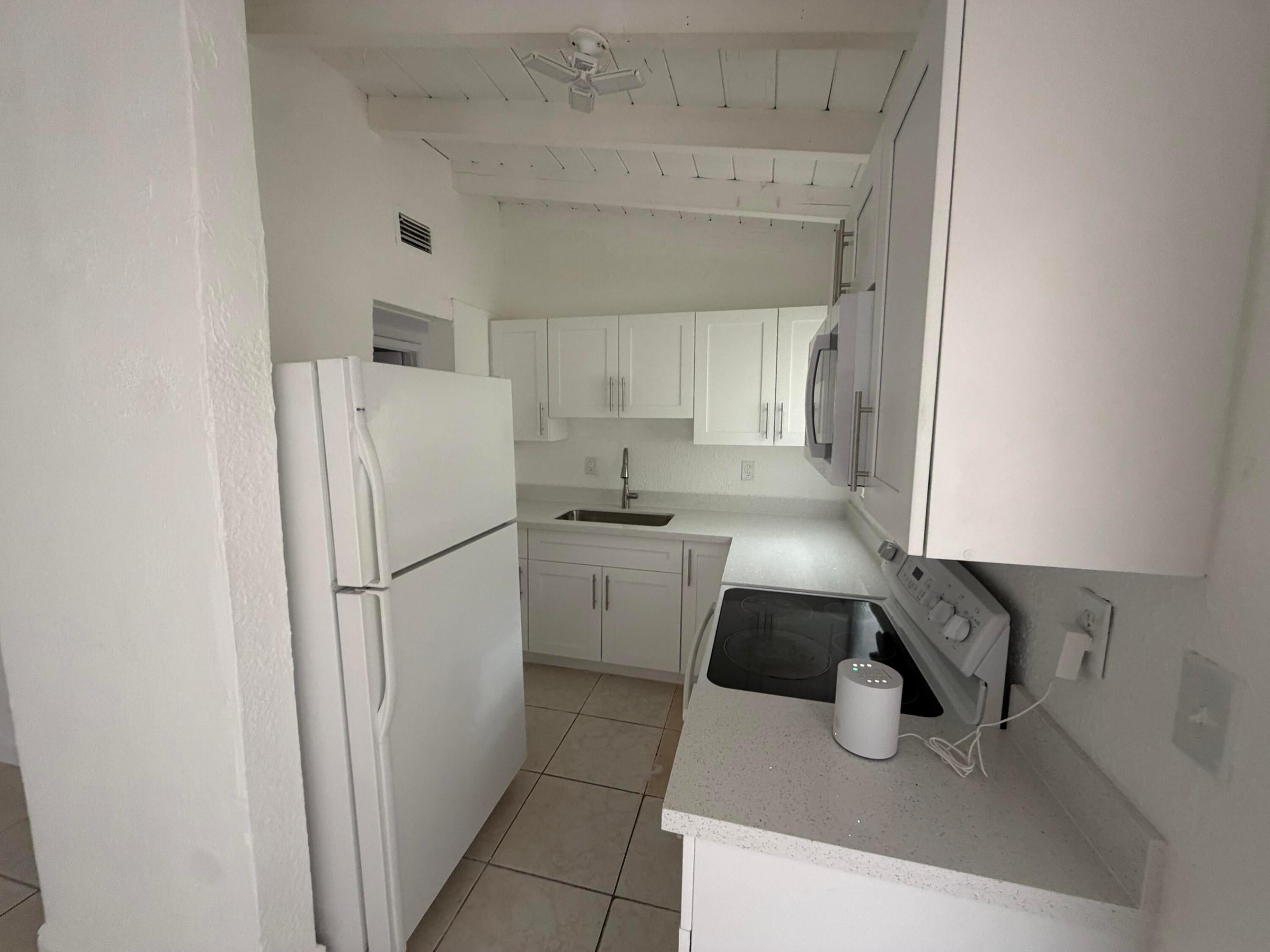View photos, virtual tours, details... 1729 NW 16th Avenue