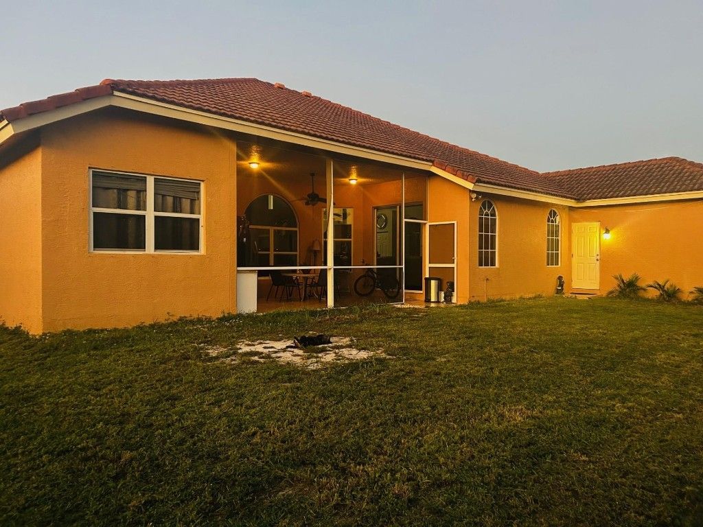 Photo of 874 SW Mccracken Avenue, Port Saint Lucie, FL 34953 (MLS # F10530543)