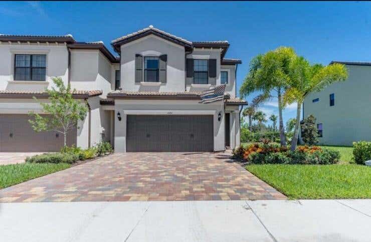 Photo of 4484 San Fratello Circle Cir, Lake Worth Beach, FL 33467 (MLS # R10774253)