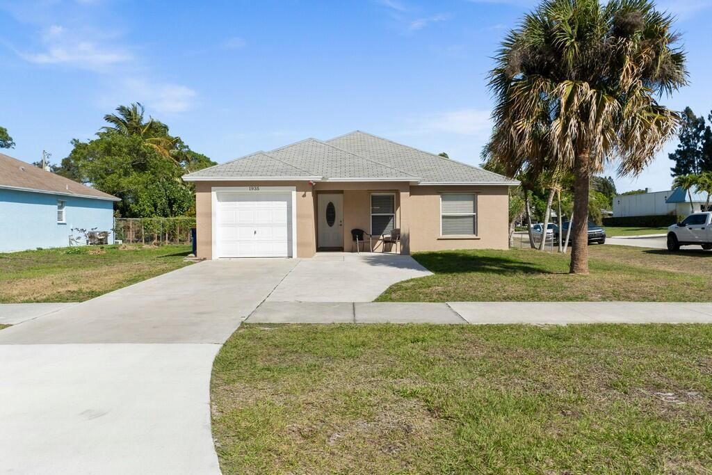 Photo of 1935 NE Dixie Highway, Jensen Beach, FL 34957 (MLS # R10777946)