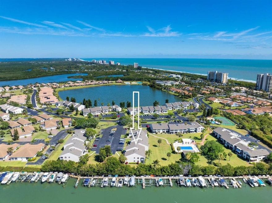 Owner Financing Available! Beautifully furnished 2-bed, 2-bath, 2nd-floor condo on sought-after North Hutchinson Island. Designed with refreshingly modern appointments, it features vaulted ceilings, tile flooring, washer/dryer, and a screened balcony overlooking the heated pool and pavilion. Prime location just steps from private beach access, community marina, and tennis court. Enjoy local parks with pickleball, playgrounds, picnic areas, and kayak/canoe launches. Dock slips available for purchase/rent. Pet-friendly. A perfect getaway, seasonal rental, or primary home in a coastal paradise. Make this island retreat yours today!