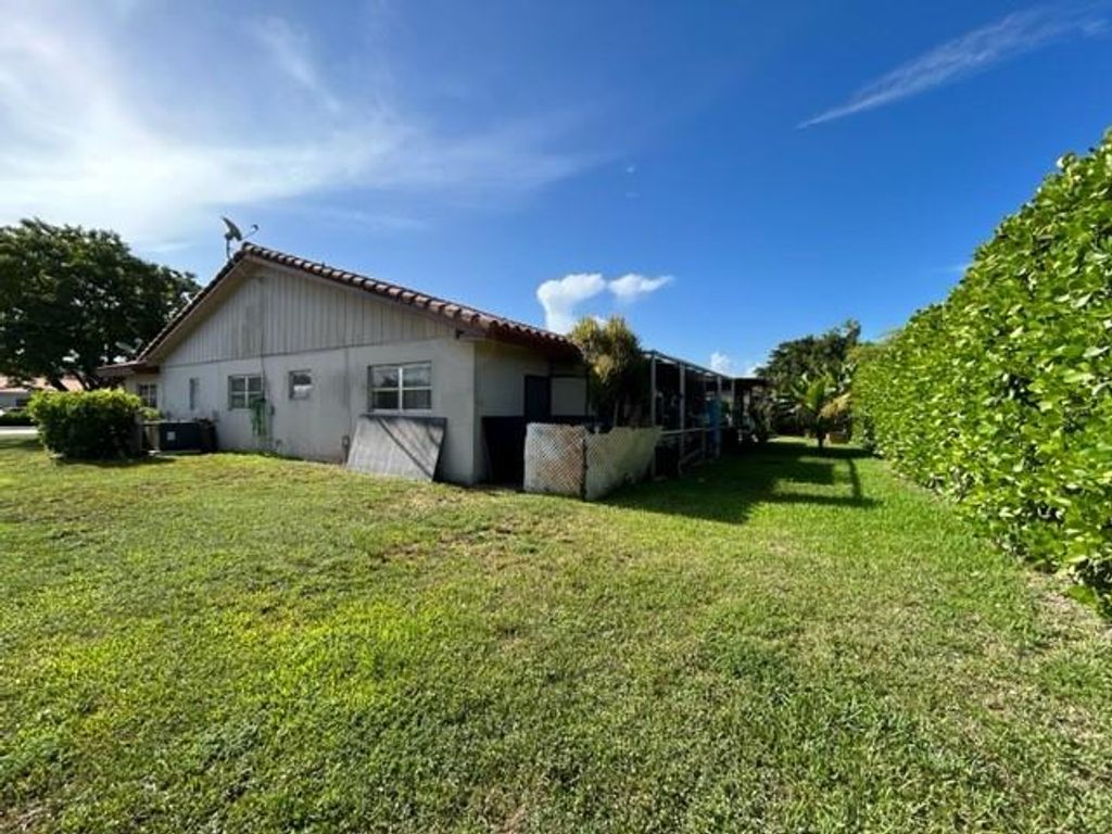 Photo of 3720 NW 110th Ave, Coral Springs, FL 33065 (MLS # F10518638)