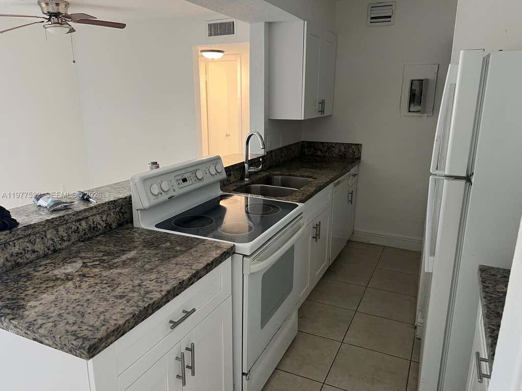 Photo of 4435 Treehouse Lane #27 H, Tamarac, FL 33319 (MLS # A11977532)