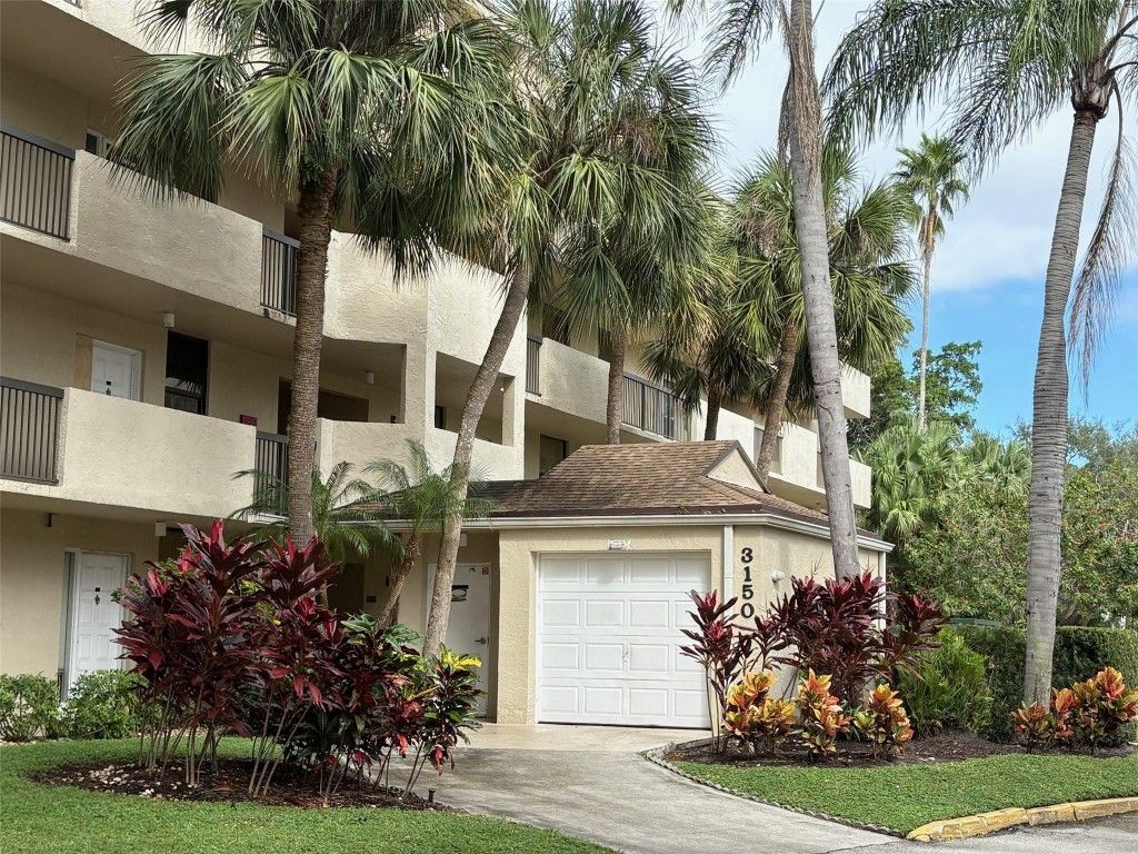 Photo of 3150 NW 42nd Avenue #E402, Coconut Creek, FL 33066 (MLS # F10471415)
