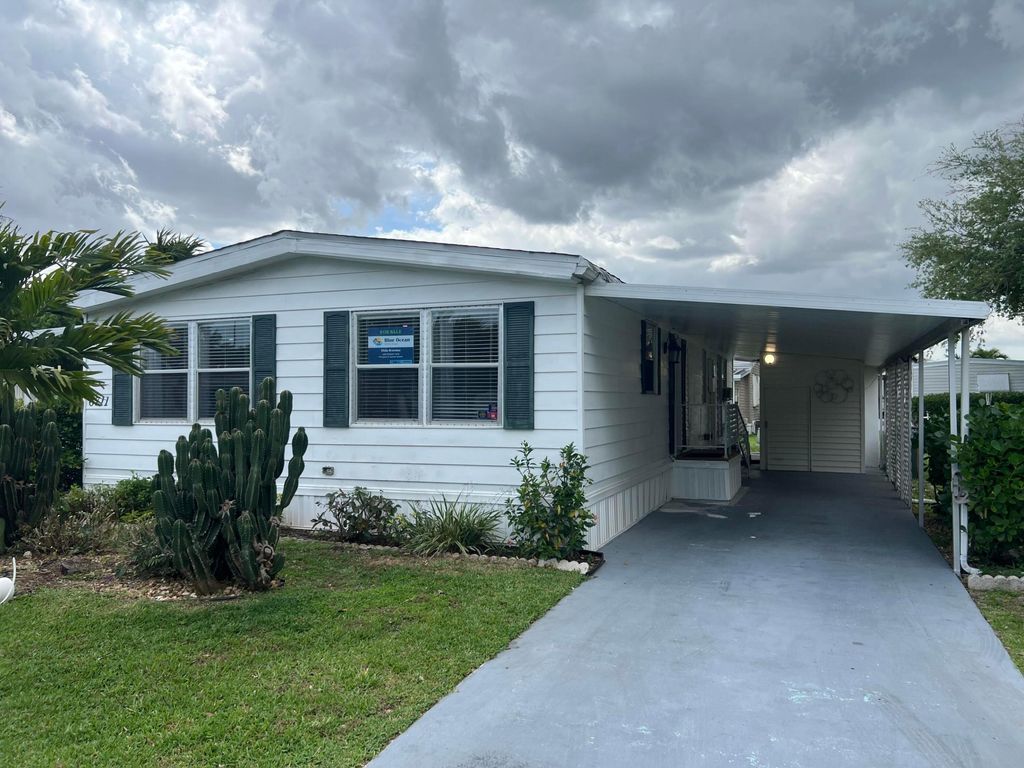 Photo of 6741 NW 44th Way NW #T-08, Coconut Creek, FL 33073 (MLS # B26001200)