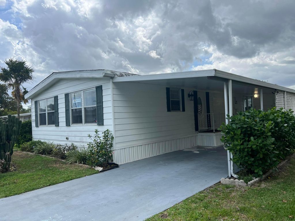 Photo of 6741 NW 44th Way NW #T-08, Coconut Creek, FL 33073 (MLS # B26001200)