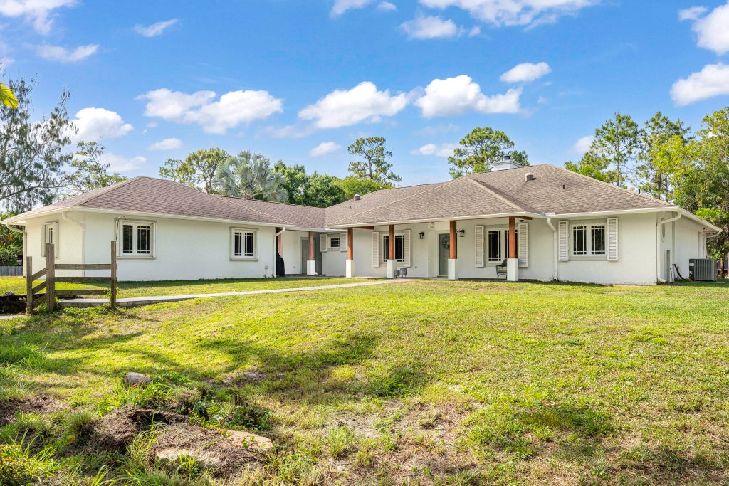 Photo of 16081 E Wiltshire Drive, The Acreage, FL 33470 (MLS # R11079490)