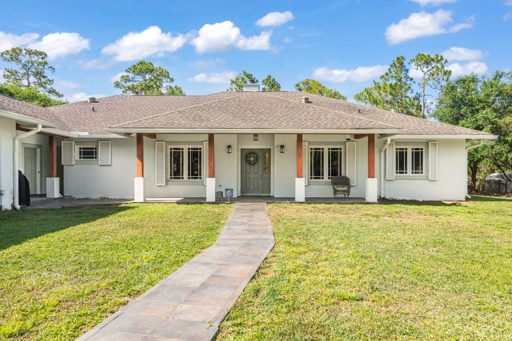 Photo of 16081 E Wiltshire Drive, The Acreage, FL 33470 (MLS # R11079490)
