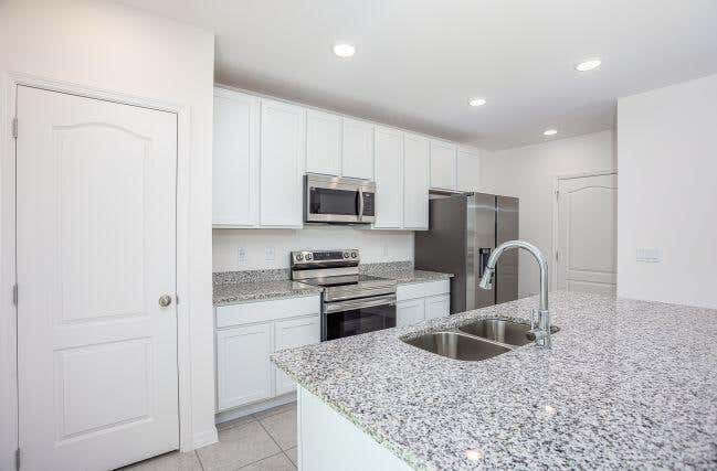 Photo of 4462 SW Gainsboro Street, Port Saint Lucie, FL 34953 (MLS # B26040048)