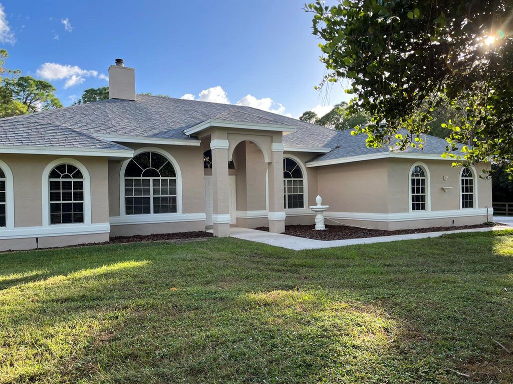 Photo of 12082 73rd Court N, West Palm Beach, FL 33412 (MLS # R10931501)