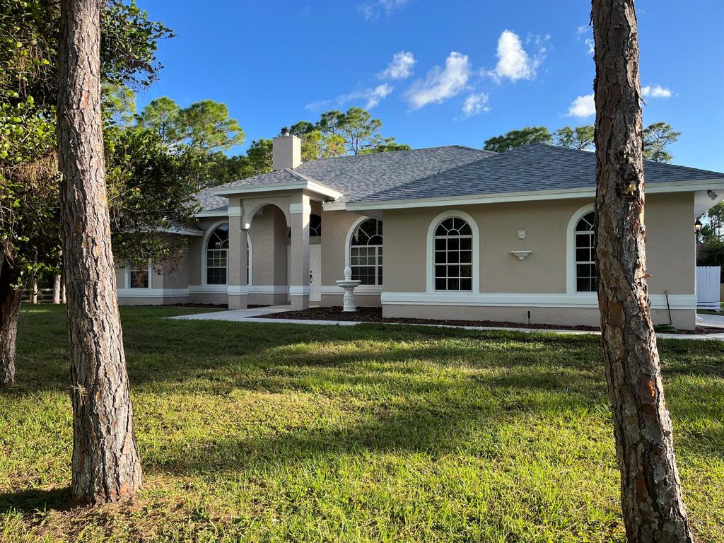 Photo of 12082 73rd Court N, West Palm Beach, FL 33412 (MLS # R10931501)