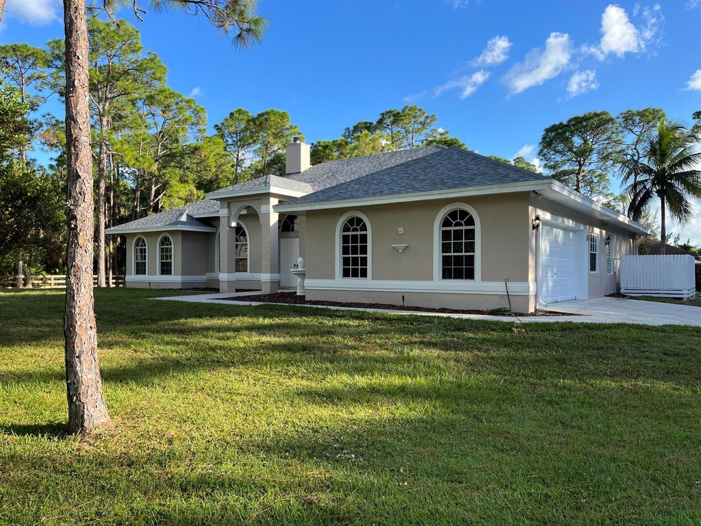 Photo of 12082 73rd Court N, West Palm Beach, FL 33412 (MLS # R10931501)