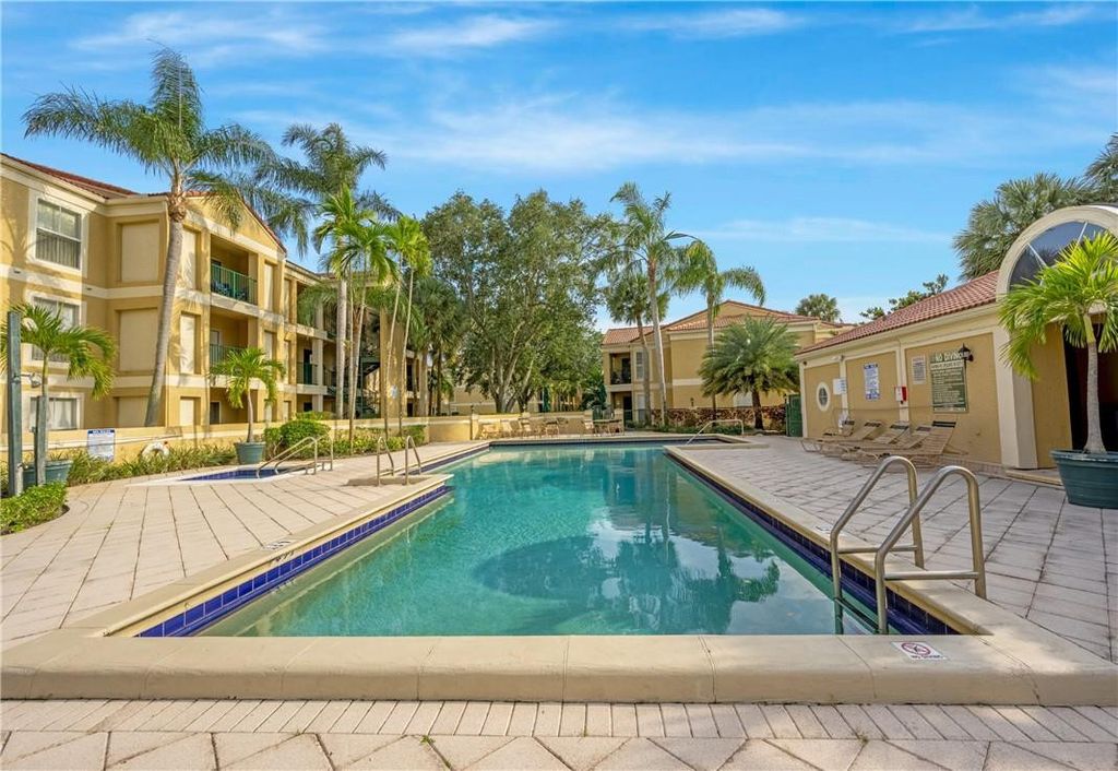 Photo of 799 Riverside Drive #1021, Coral Springs, FL 33071 (MLS # B26025798)