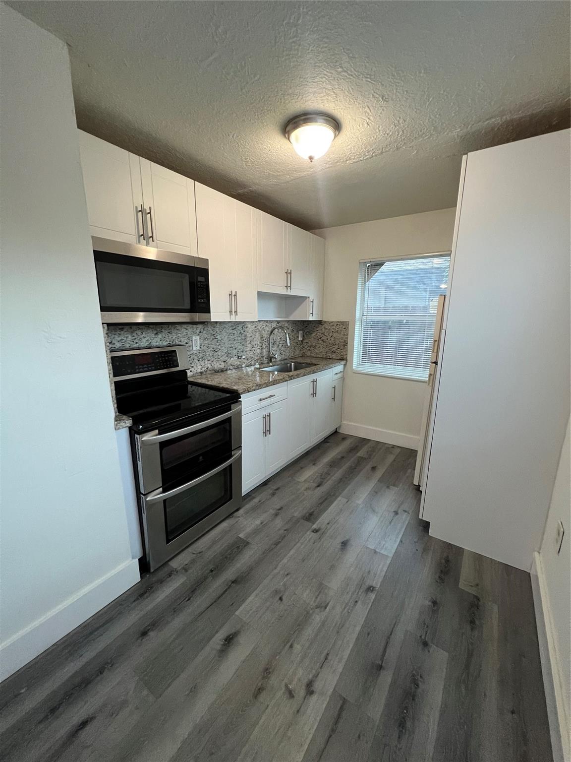 242 NW 14th St