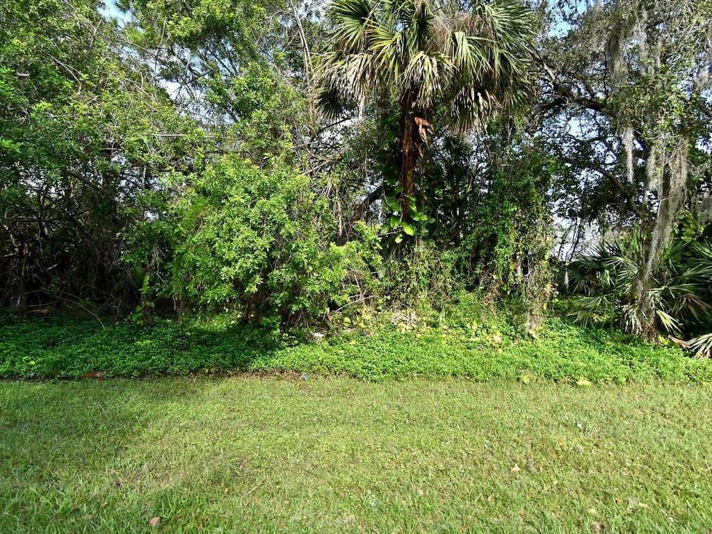 Photo of 7506 Santa Clara Blvd, Fort Pierce, FL 34951 (MLS # R10993470)