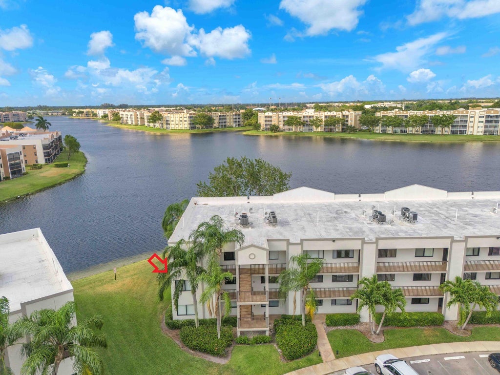 Photo of 10448 E Clairmont Circle #201, Tamarac, FL 33321 (MLS # F10437711)