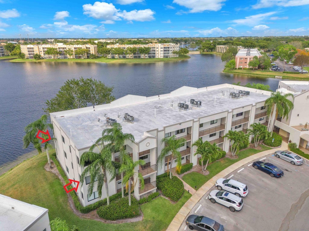 Photo of 10448 E Clairmont Circle #201, Tamarac, FL 33321 (MLS # F10437711)