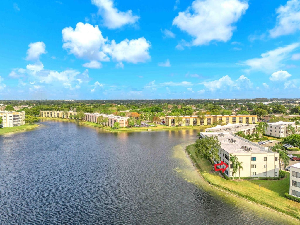 Photo of 10448 E Clairmont Circle #201, Tamarac, FL 33321 (MLS # F10437711)