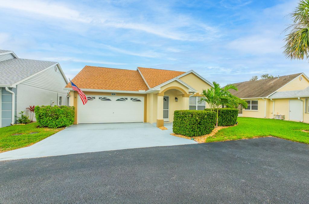 Photo of 445 NW Sherry Lane, Port Saint Lucie, FL 34986 (MLS # R11165607)